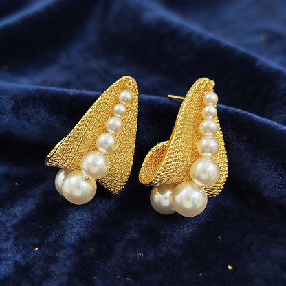 Pendientes de perlas de estilo único, con diseño retro y exclusivo, con un toque de personalidad.